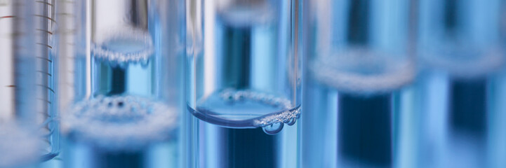 Test tube of glass overflows liquid solution potassium