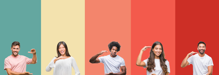 Collage of different ethnics young people over colorful stripes isolated background gesturing with hands showing big and large size sign, measure symbol. Smiling looking at the camera