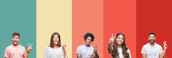 Collage of different ethnics young people over colorful stripes isolated background smiling with happy face winking at the camera doing victory sign. Number two.