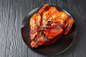 whole roasted chicken on a plate © myviewpoint