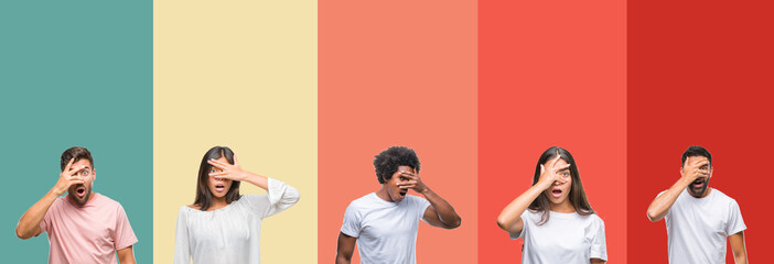 Collage of different ethnics young people over colorful stripes isolated background peeking in shock covering face and eyes with hand, looking through fingers with embarrassed expression.