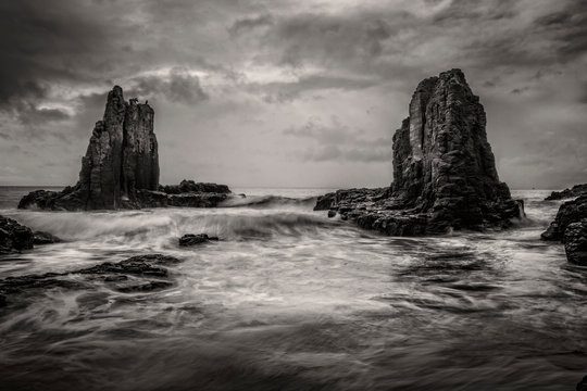 Dramatic skies above  coastal sea stacks