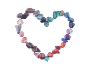heart of colored stones on a white background