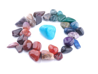 colored stones on a white background