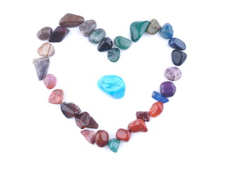 heart of colored stones on a white background