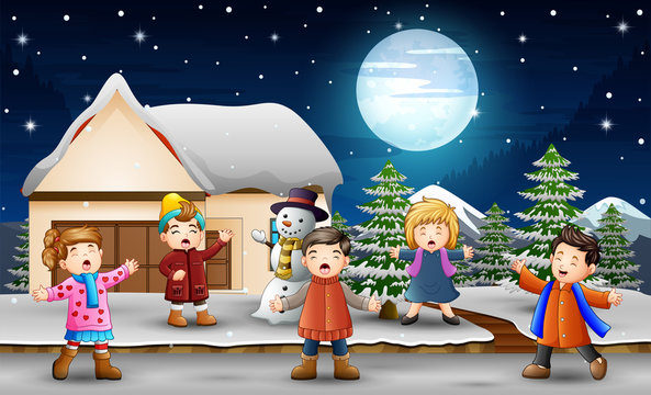 Cartoon kids singing in front of the snowing house