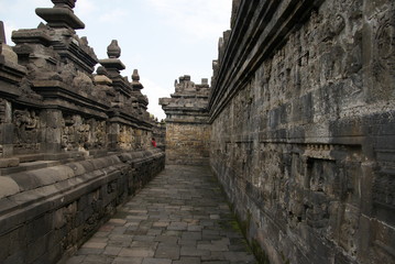 Fototapeta premium Relief or carvings on the wall of Borobudur Temple in Jogjakarta, Indonesia