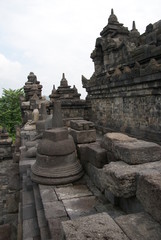 Fototapeta na wymiar Relief or carvings on the wall of Borobudur Temple in Jogjakarta, Indonesia