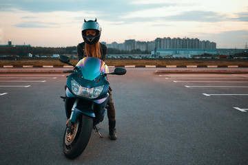Full length isolated picture of fashionable active young female with blonde hair wearing safety...