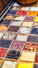 Collection colorful mosaic spices in wooden box. Assortment of condiment cooking ingredient. Seasoning background banner