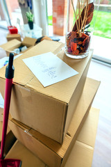 Detail of stack of moving boxes with checklist