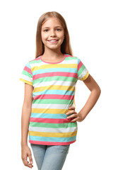 Fototapeta premium Smiling little girl in t-shirt on white background