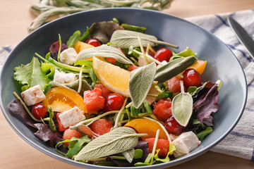 Delicious watermelon salad on plate, closeup