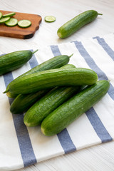 Fresh raw organic green cucumbers, side view. Close-up.