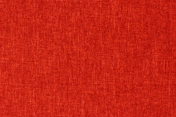 Red textile  texture for background with visible fibers. 
