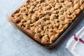 Homemade Whole Crumble Cake in Glass Bowl. Freshly Baked.