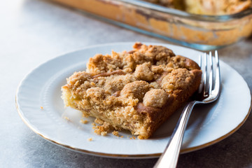 Homemade Apple Crumble Cake Slice with Fork.