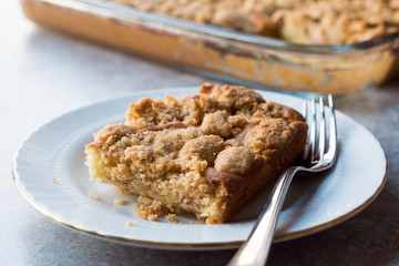 Homemade Apple Crumble Cake Slice with Fork.