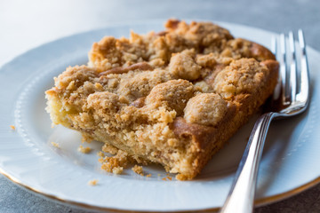Homemade Apple Crumble Cake Slice with Fork.