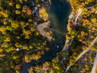 Kravica waterfall in autumn colors, aerial drone view