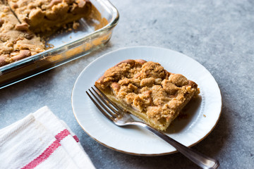 Homemade Apple Crumble Cake Slice with Fork.