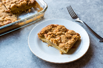 Homemade Apple Crumble Cake Slice with Fork.