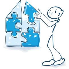 Strichmännchen baut aus einen Puzzle ein Haus