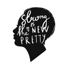 Strong is the new pretty. Woman's head silhouette. Hand drawn vector illustration