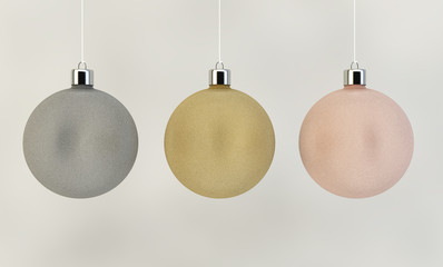 three colorful christmas balls