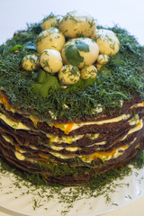 liver cake painted with herbs and mushrooms