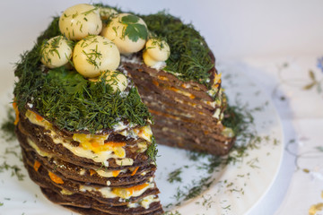 liver cake painted with herbs and mushrooms