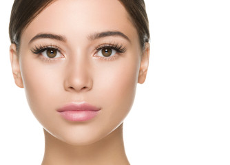 Fototapeta premium Beautiful woman face close up healthy skin and beauty lashes soft lips isolated on white