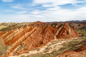Danxia Feng, or Colored Rainbow Mountains, in Zhangye, Gansu, China. Here the view from the Colorful Embroidered observation deck