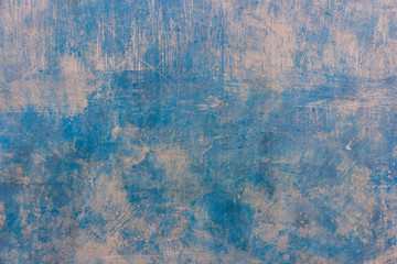 old blue paint texture of cement plastered wall