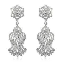 Pair of silver diamond earrings isolated on white