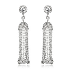 Pair of silver diamond earrings isolated on white