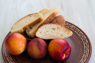Homemade bread and fruit for a traditional breakfast. Close-up. Top view