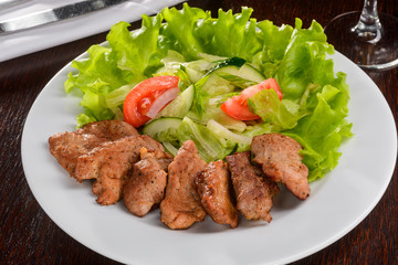 Pork tenderlion with vegetable salad
