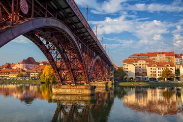 Raamstickers Maribor, Slovenia. Cityscape image of Maribor, Slovenia during autumn day with reflection of the city in Drava River. © rudi1976