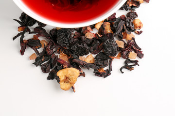 Still life, aromatic dry tea with fruits and petals