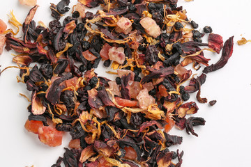Still life, aromatic dry tea with fruits and petals