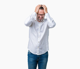 Fototapeta premium Handsome middle age elegant senior business man wearing glasses over isolated background suffering from headache desperate and stressed because pain and migraine. Hands on head.