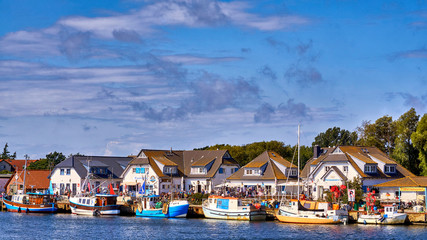 Harbor in Vitte with fishing boats on a sunny beautiful day, Hiddensee island, Baltic Sea, Germany - obrazy, fototapety, plakaty