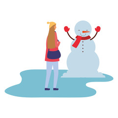 woman with snowman winter season