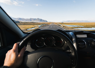 View from driver's seat over the coastal road at the South of Iceland