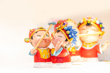 Obraz na płótnie Canvas Romantic cute Chinese traditional groom bride doll