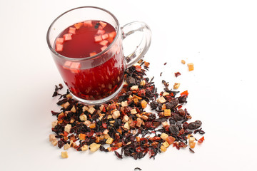 Still life, aromatic dry tea with fruits and petals