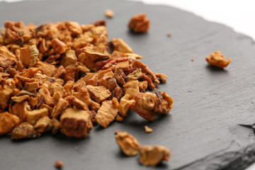 Still life, aromatic dry tea with fruits and petals