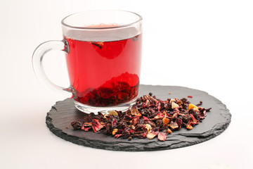 Still life, aromatic dry tea with fruits and petals