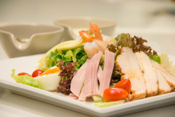 A mixed salad with sauce